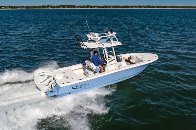 2025 R266 Cayman Sky Deck Running in Ocean Rear Starboard View